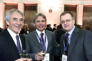 Drs. Landerio, Osorio-Fonseca and Grotenhuis share a toast at the International Reception