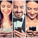 Happy people using mobile smart phone