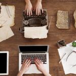 Old typewriter and laptop. Concept of technology progress